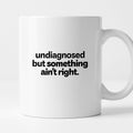 Kubek z nadrukiem - "undiagnosed but something ain't right"