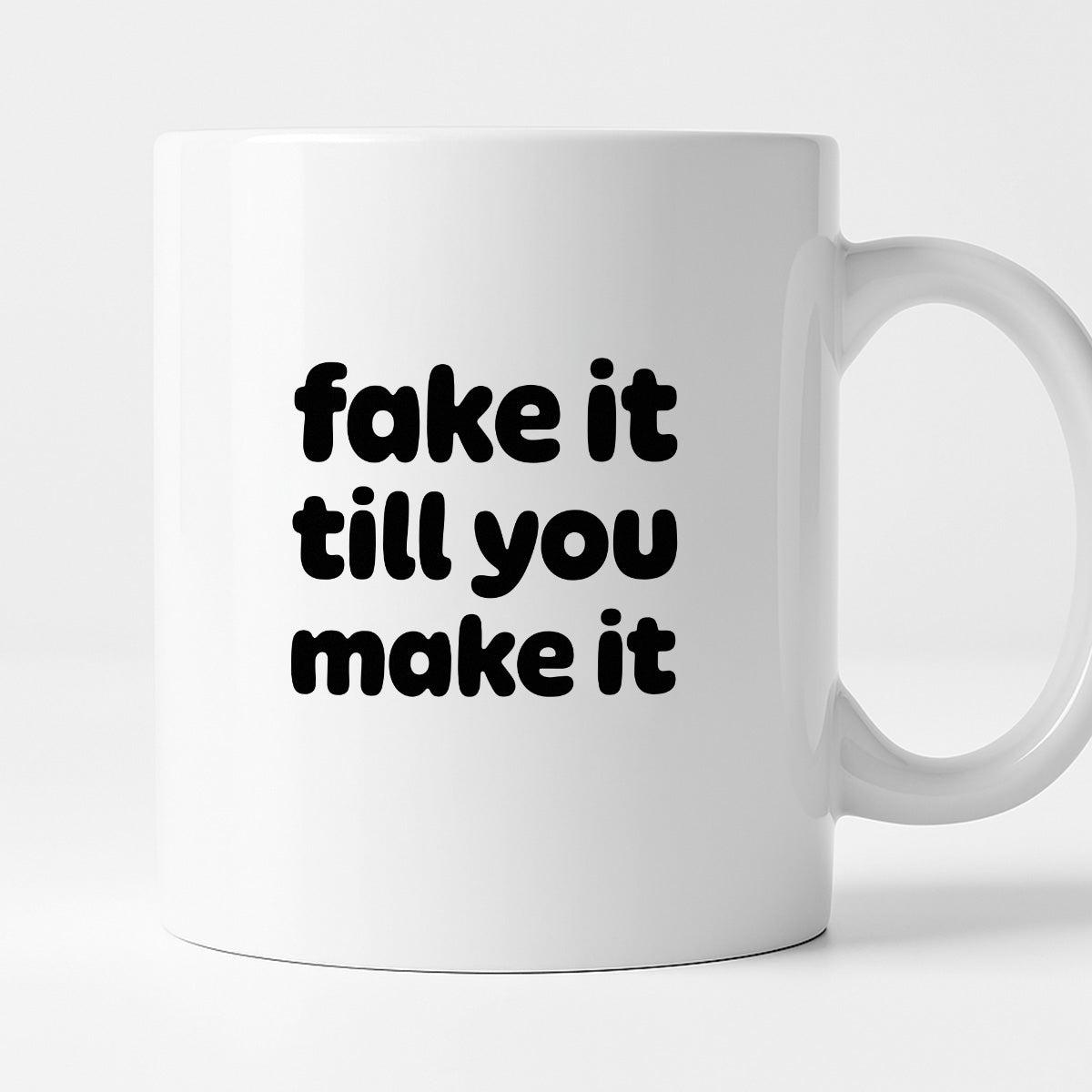 Kubek z nadrukiem - "fake it till you make it"