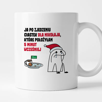 Kubek świąteczny mem "Ja po zjedzeniu ciastek dla Mikołaja, które położyłam 5 minut wcześniej"