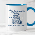 Kubek z nadrukiem "Undiagnosed but somethin aint right"
