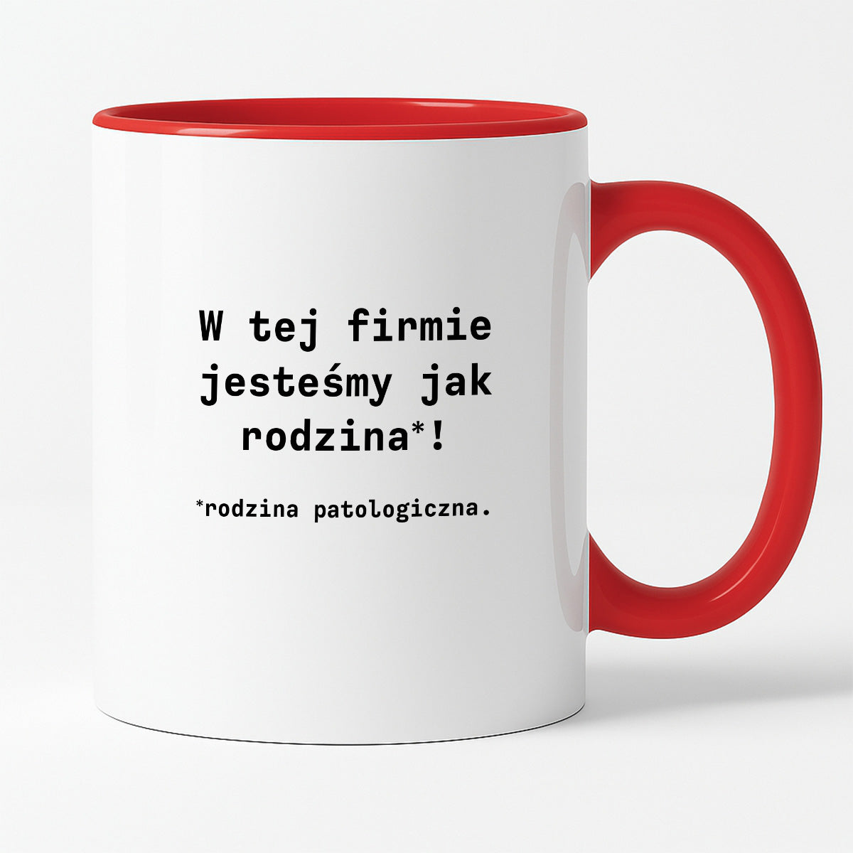 Kubek z nadrukiem "W tej firmie jestesmy jak rodzina*! Rodzina patologiczna."