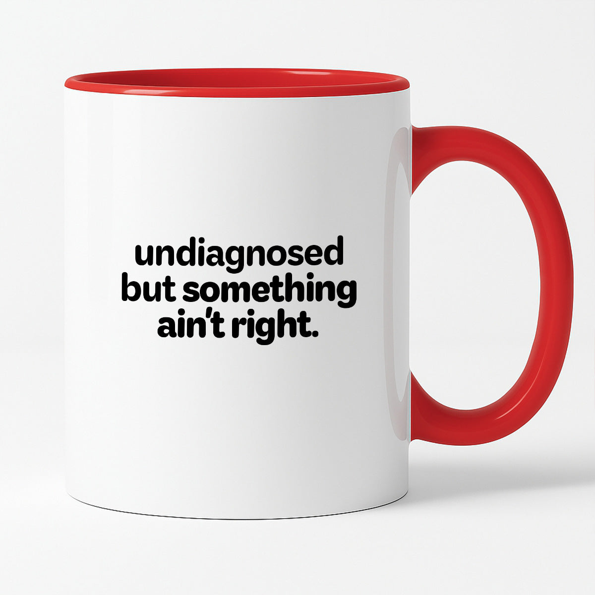 Kubek z nadrukiem - "undiagnosed but something ain't right"
