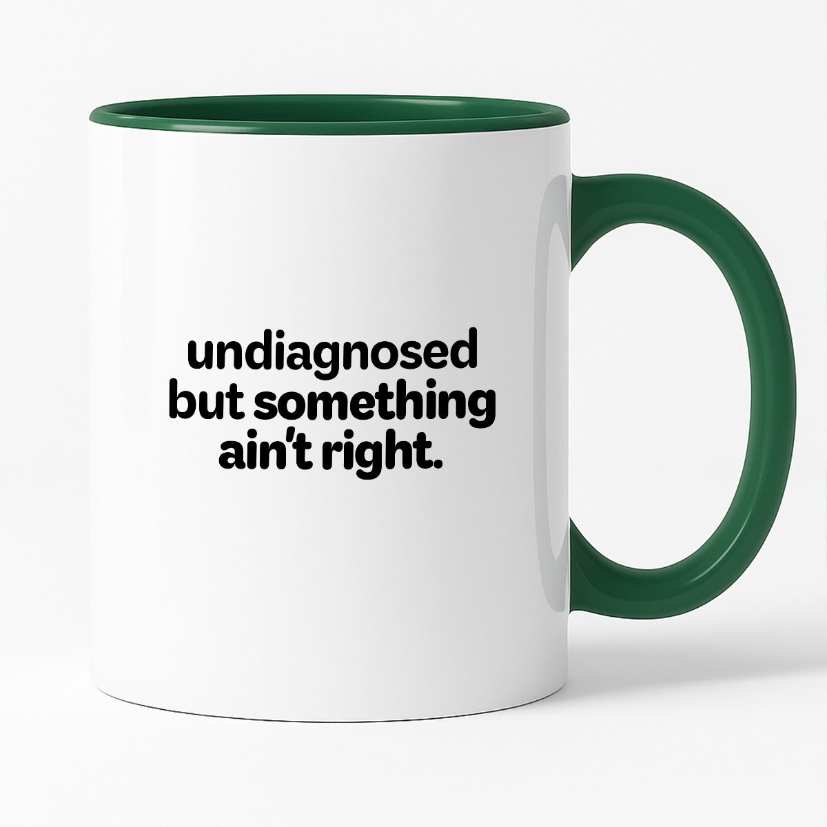 Kubek z nadrukiem - "undiagnosed but something ain't right"
