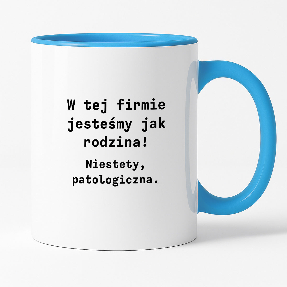 Kubek z nadrukiem "W tej firmie jestesmy jak rodzina! Niestety, patologiczna."
