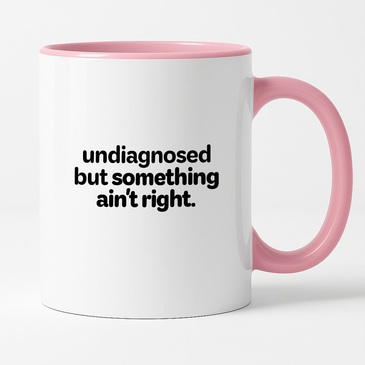 Kubek z nadrukiem - "undiagnosed but something ain't right"