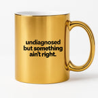 Kubek z nadrukiem - "undiagnosed but something ain't right"
