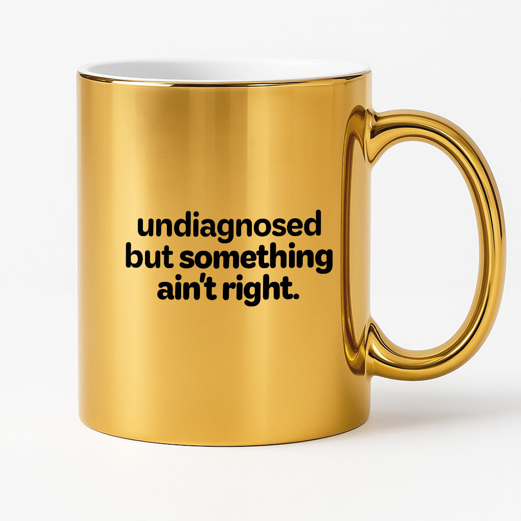 Kubek z nadrukiem - "undiagnosed but something ain't right"