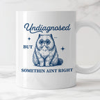 Kubek z nadrukiem "Undiagnosed but somethin aint right"
