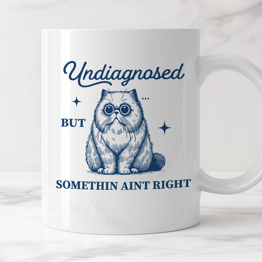 Kubek z nadrukiem "Undiagnosed but somethin aint right"