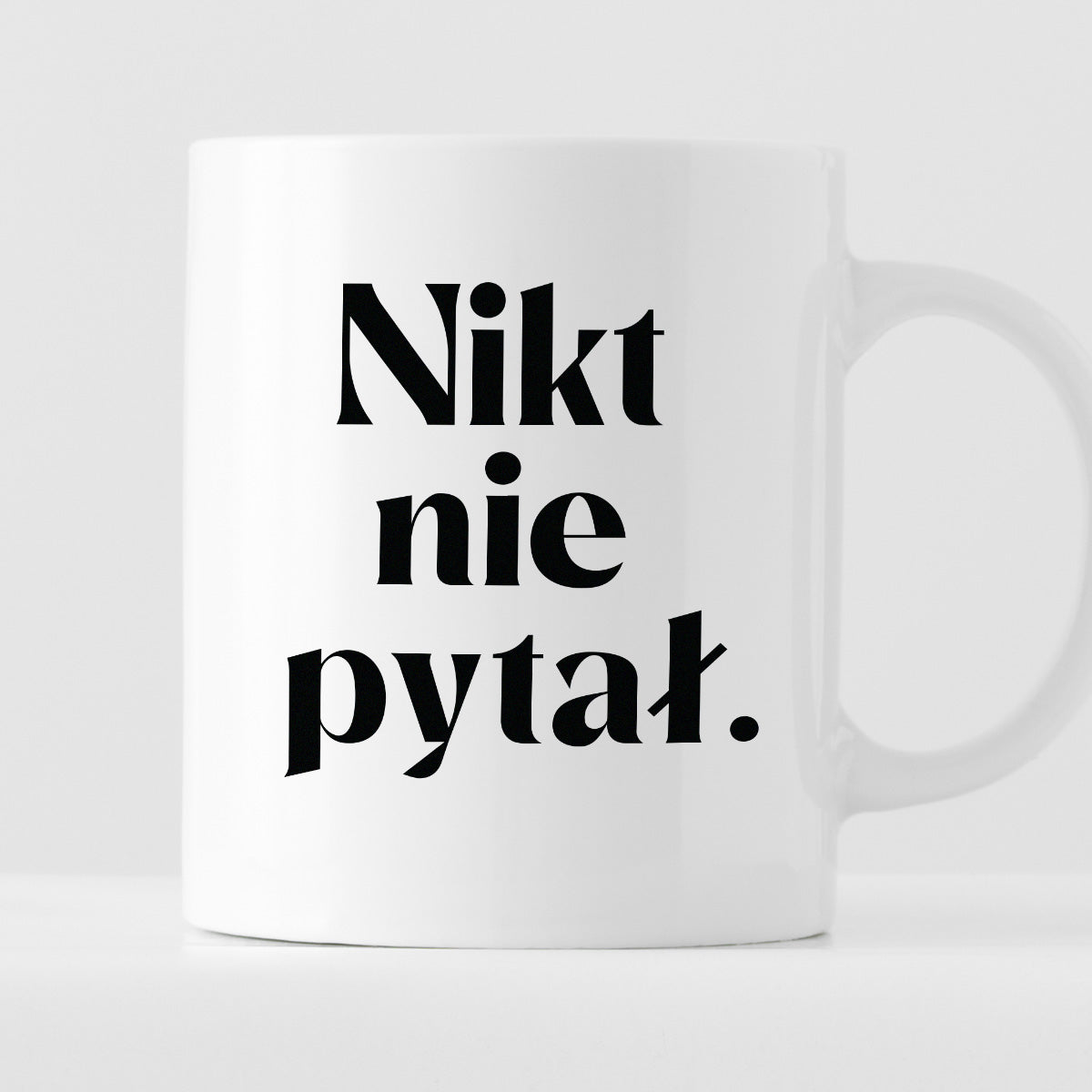 Kubek z nadrukiem "Nikt nie pytał."