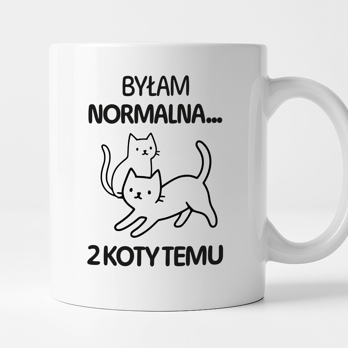Kubek z nadrukiem "Byłam normalna dwa koty temu..."