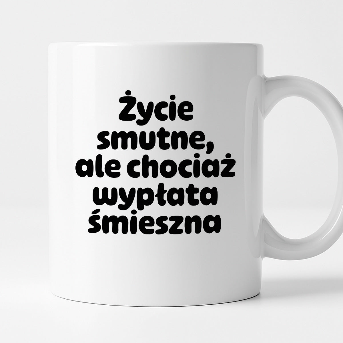 Kubek z nadrukiem "Życie smutne, ale chociaż wypłata śmieszna"