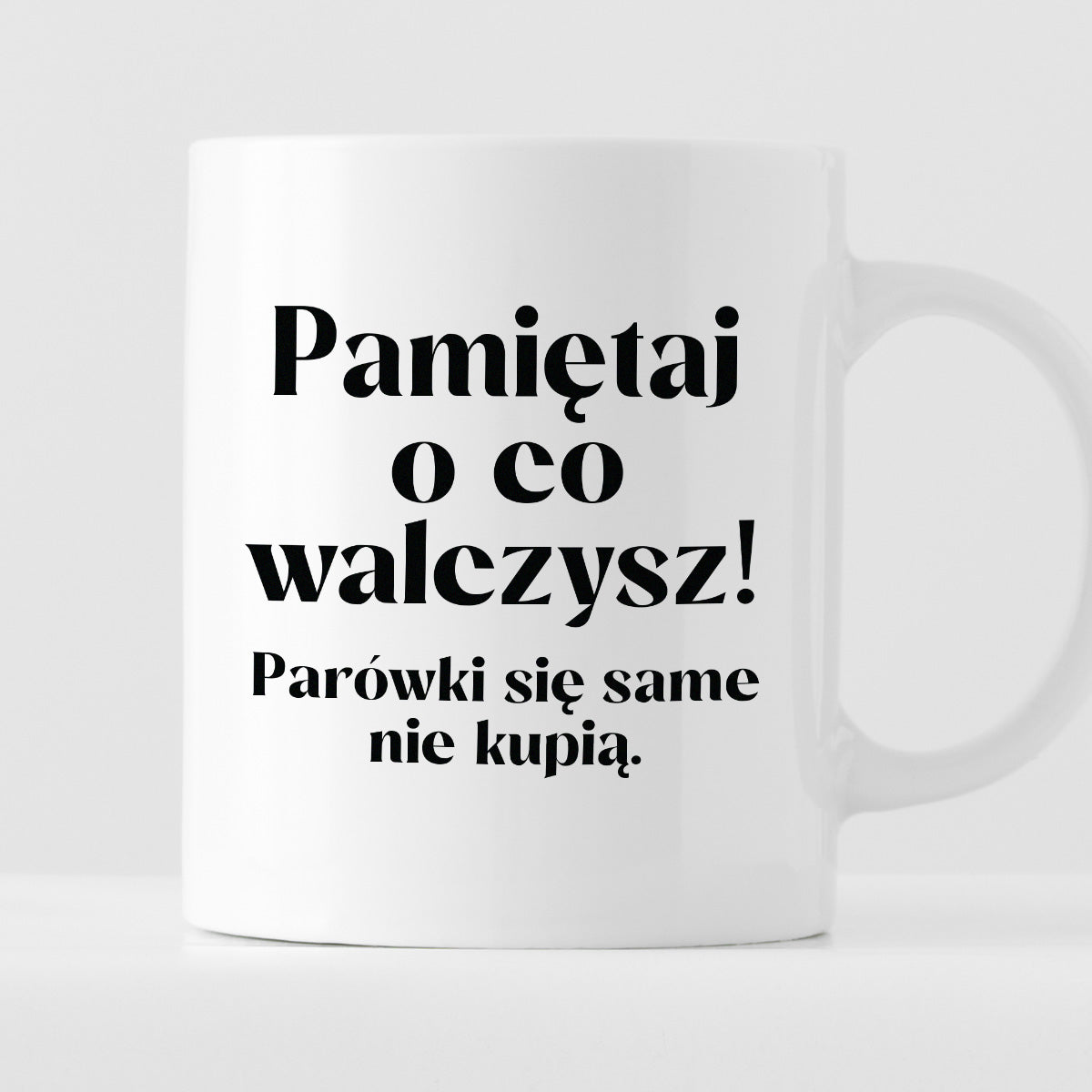 Kubek z nadrukiem "Pamiętaj o co walczysz - parówki się same nie kupią"