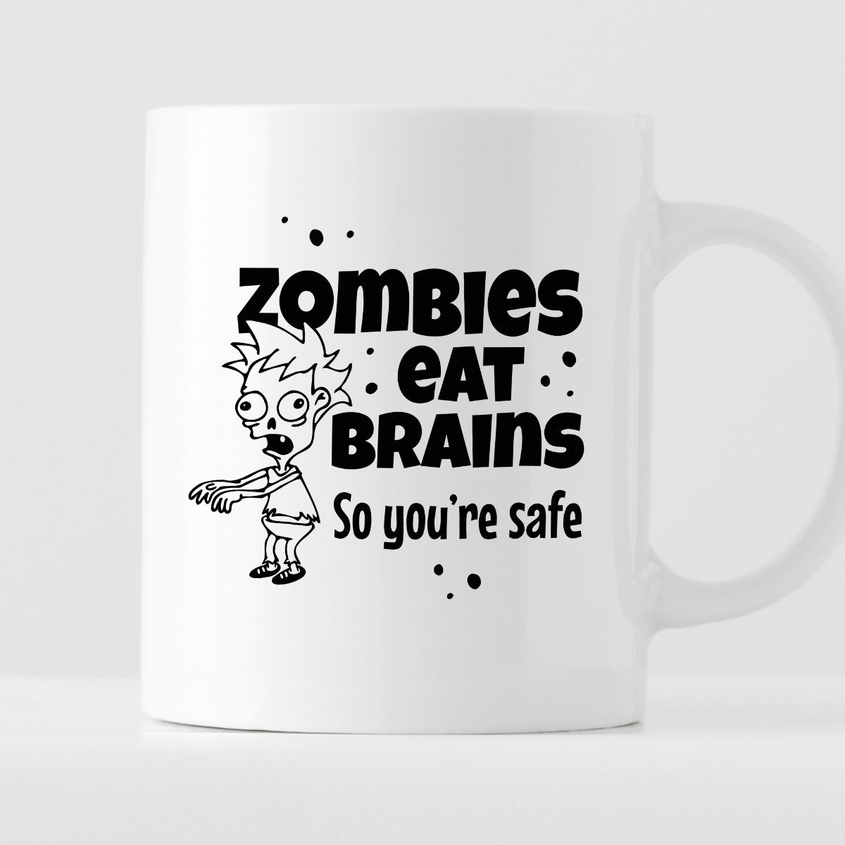 Kubek z nadrukiem "Zombies eat brains, so you’re safe"