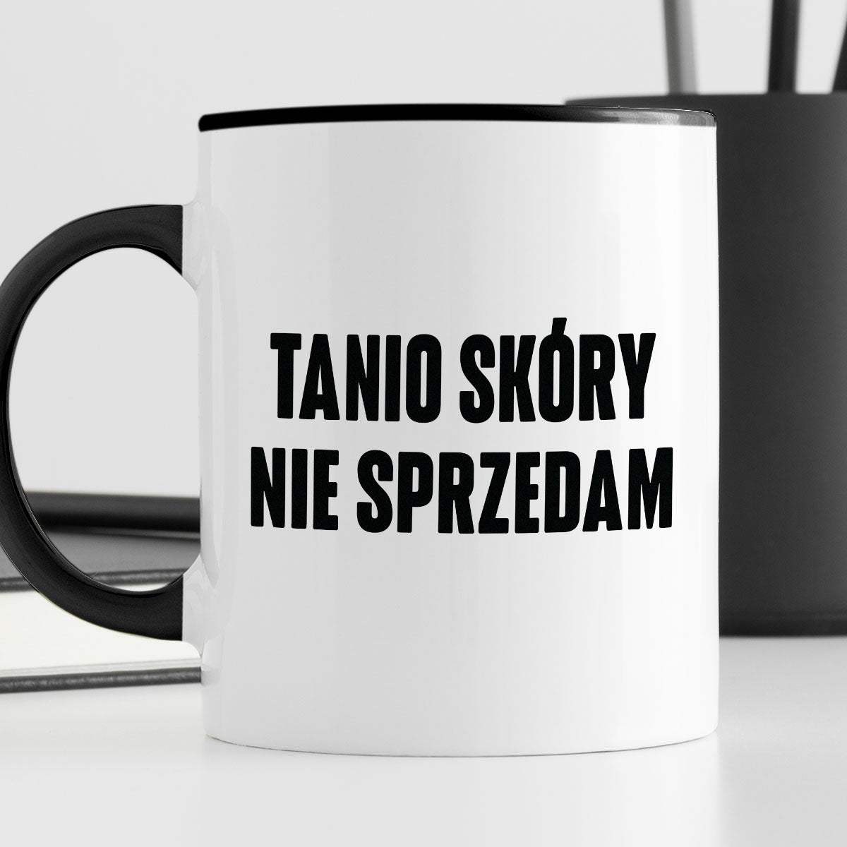 Kubek z nadrukiem "Tanio skóry nie sprzedam" cytat M. Pudzianowski