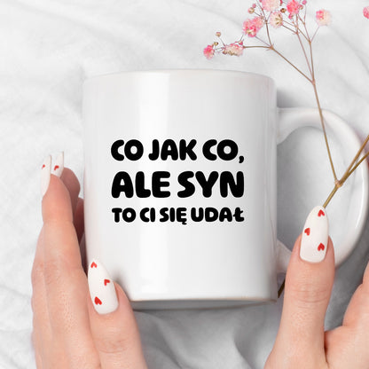 Kubek z nadrukiem - "Co jak co, ale syn to Ci się udał"