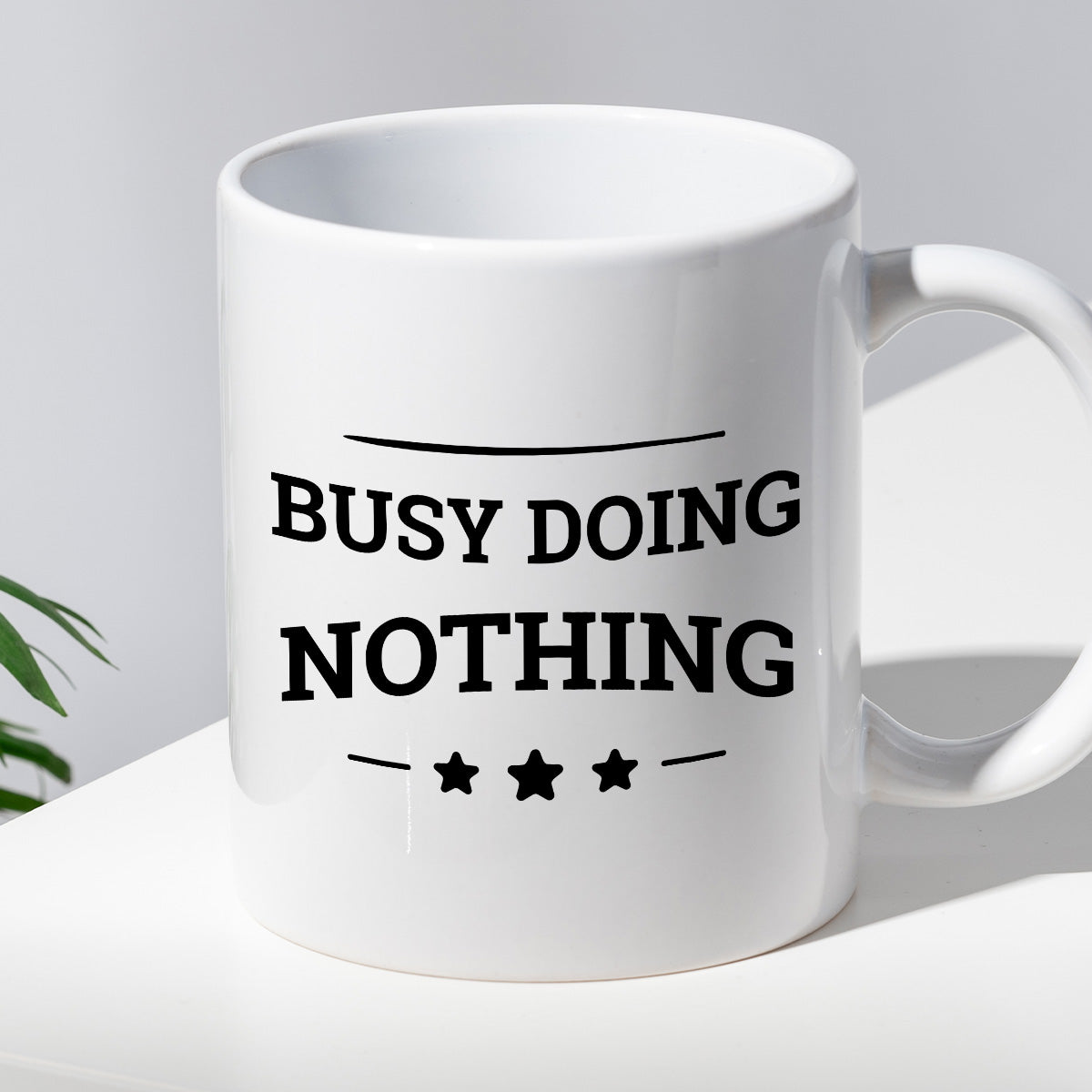 Kubek z nadrukiem "Busy doing nothing"