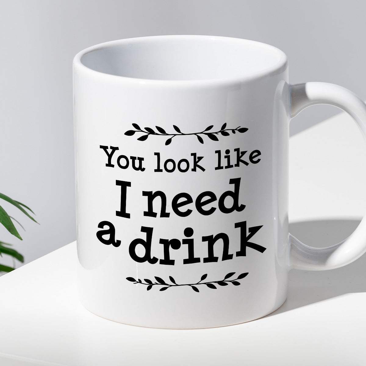 Kubek z nadrukiem "You look like I need a drink"
