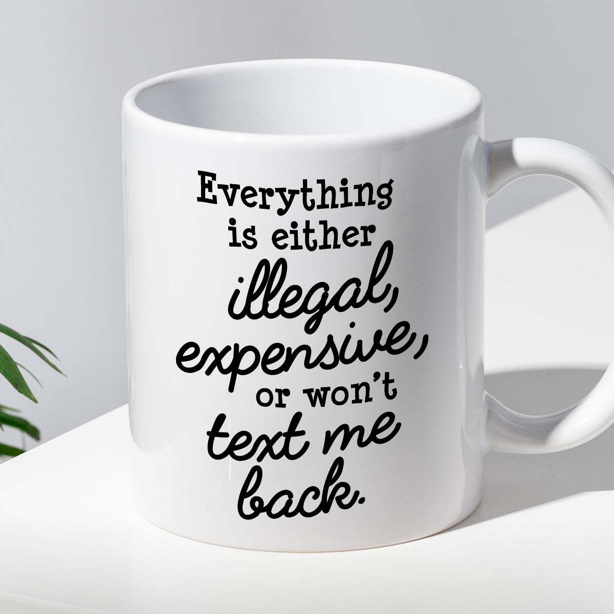 Kubek z nadrukiem "Everything is either illegal, expensive, or won’t t