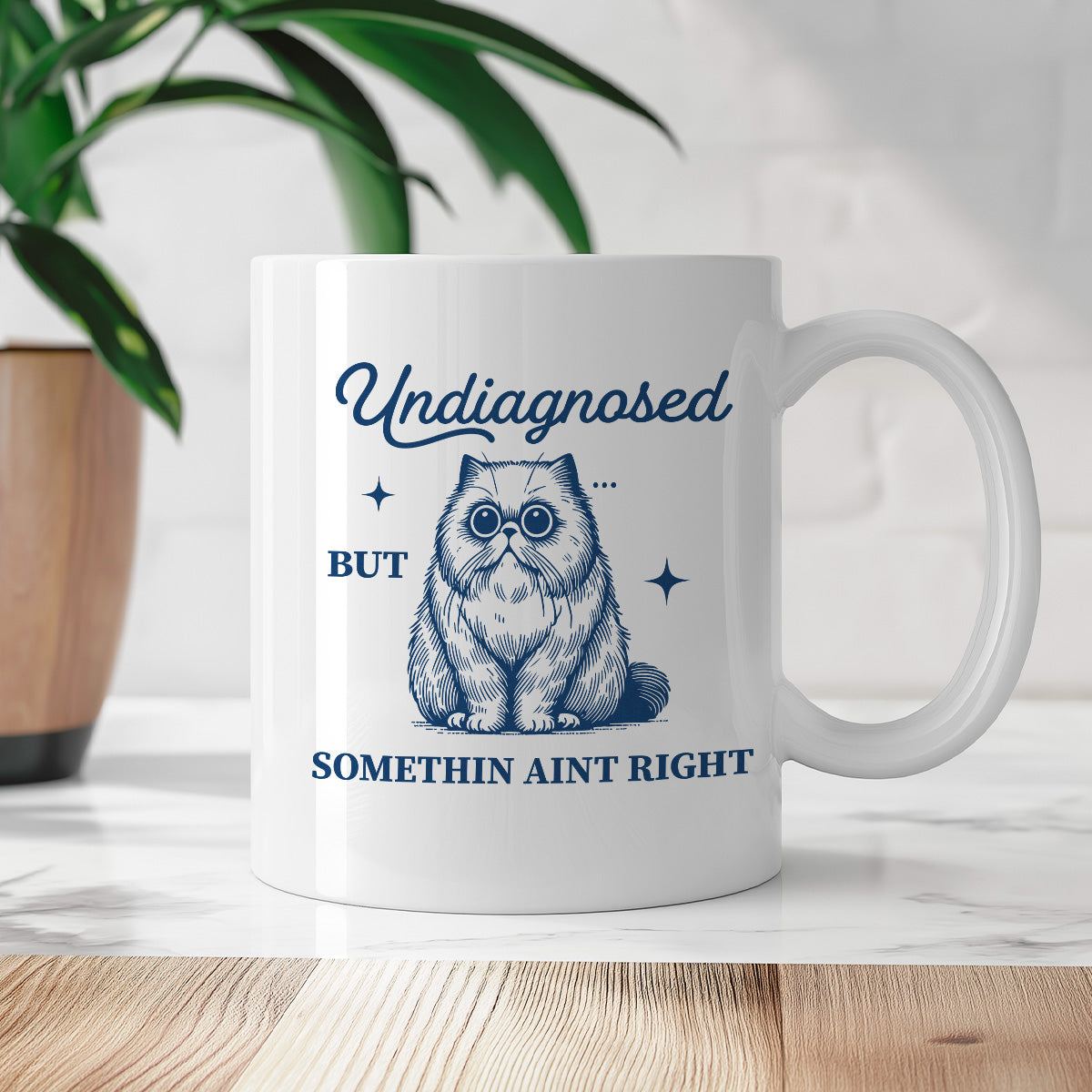 Kubek z nadrukiem "Undiagnosed but somethin aint right"