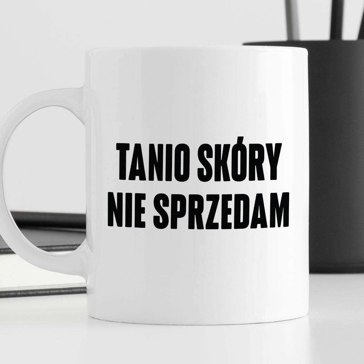 Kubek z nadrukiem "Tanio skóry nie sprzedam" cytat M. Pudzianowski