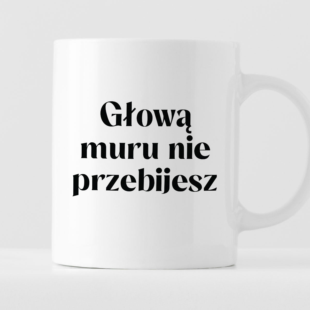 Kubek z nadrukiem "Głową muru nie przebijesz" 330 ml