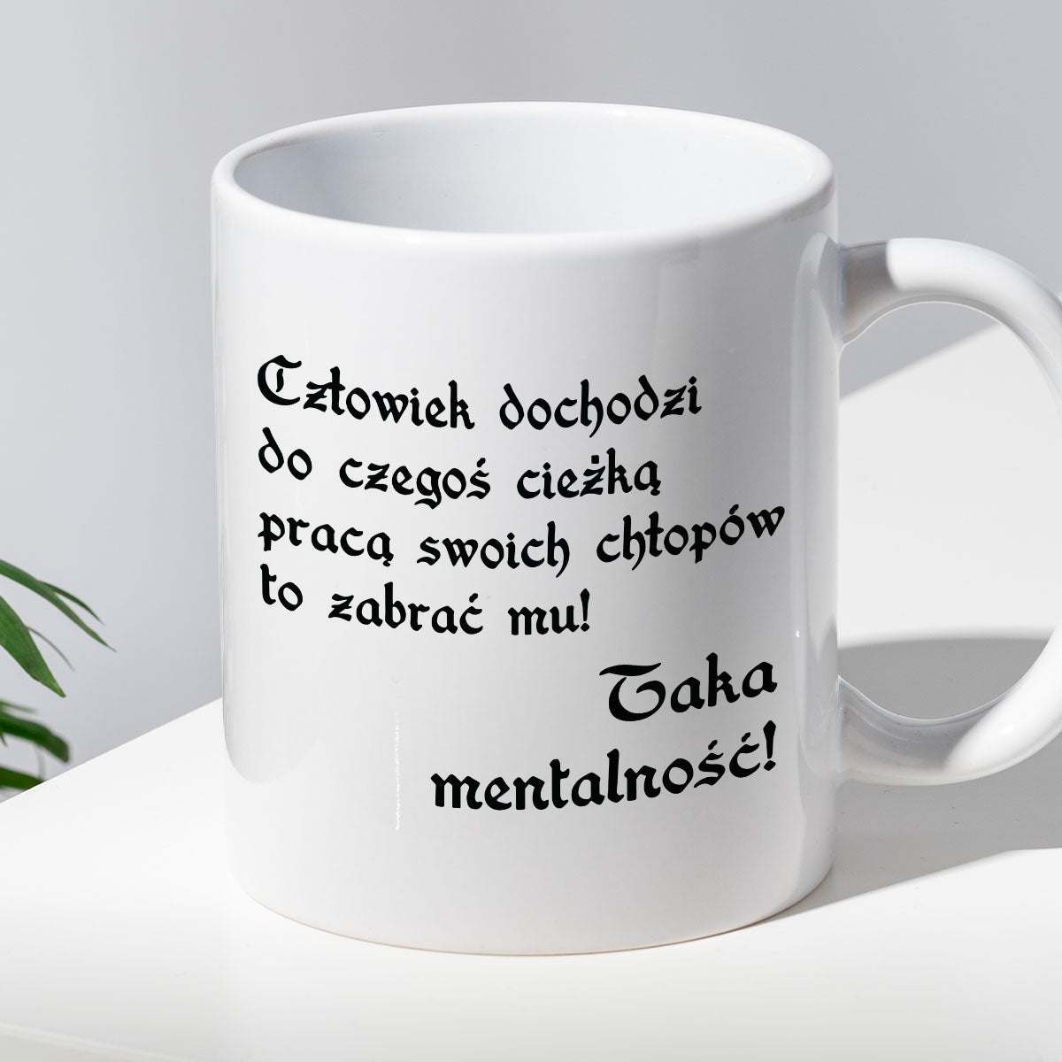 Kubek z nadrukiem "Człowiek dochodzi do czegoś ciężką pracą..."