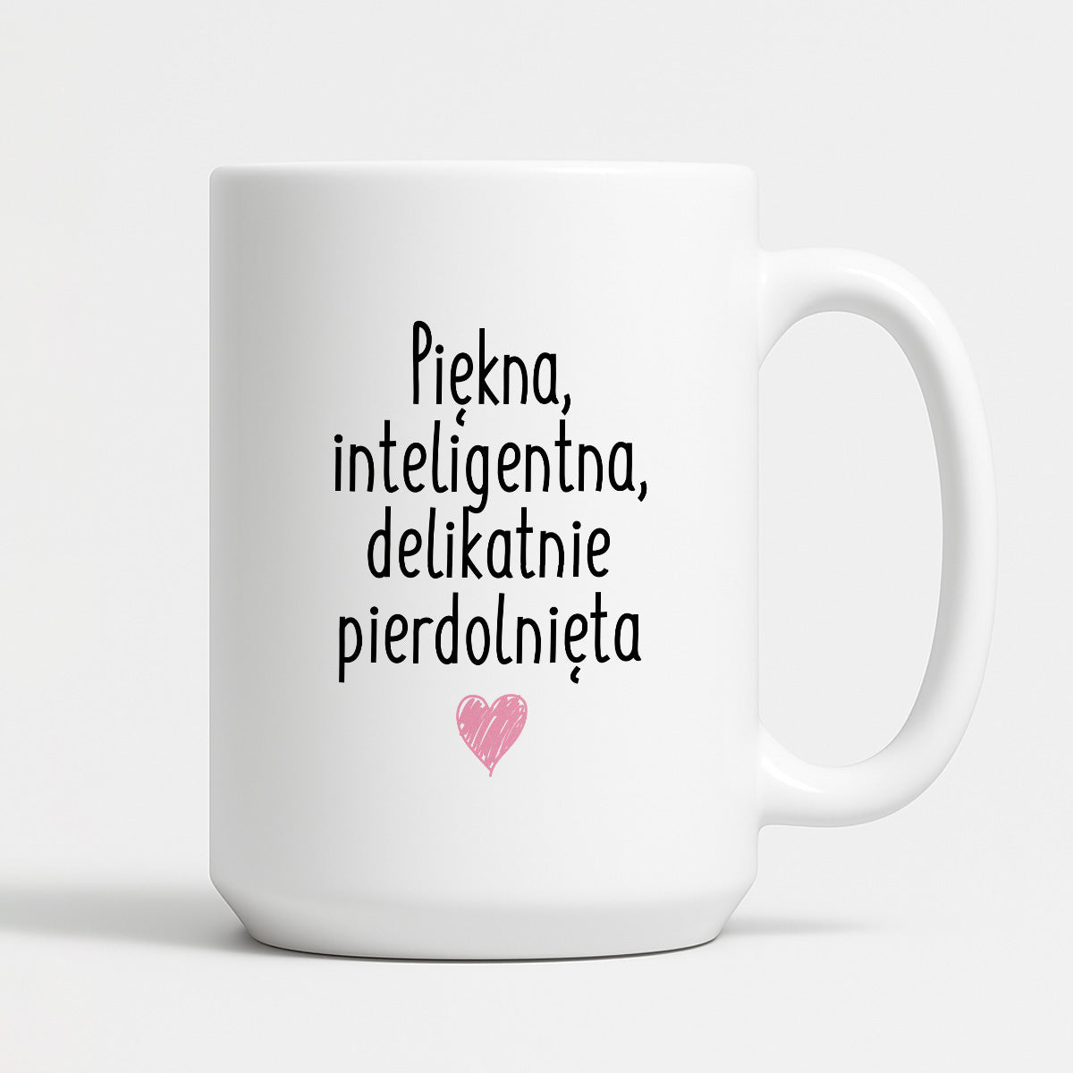 Kubek z nadrukiem "Piękna, inteligenta, delikatnie pierdolnięta"