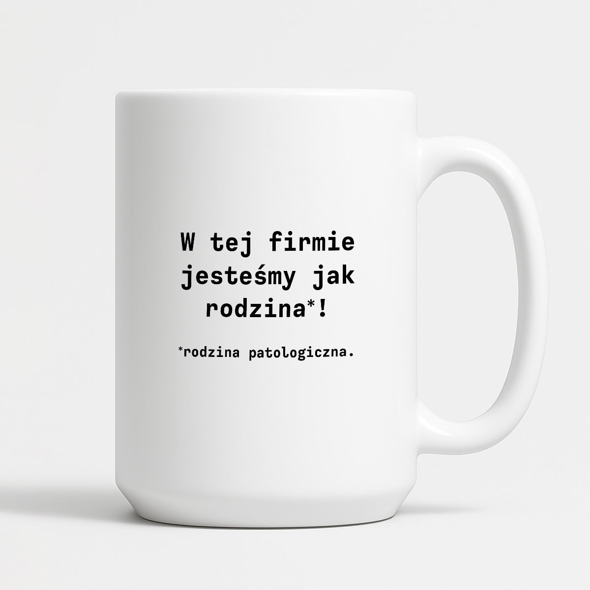 Kubek z nadrukiem "W tej firmie jestesmy jak rodzina*! Rodzina patologiczna."
