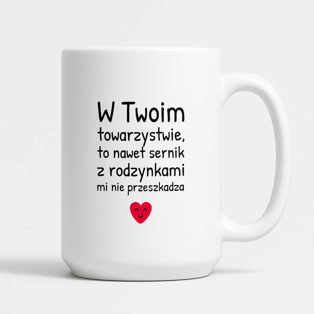 Kubek z nadrukiem - "W Twoim towarzystwie, to nawet sernik z rodzynkami mi nie przeszkadza"