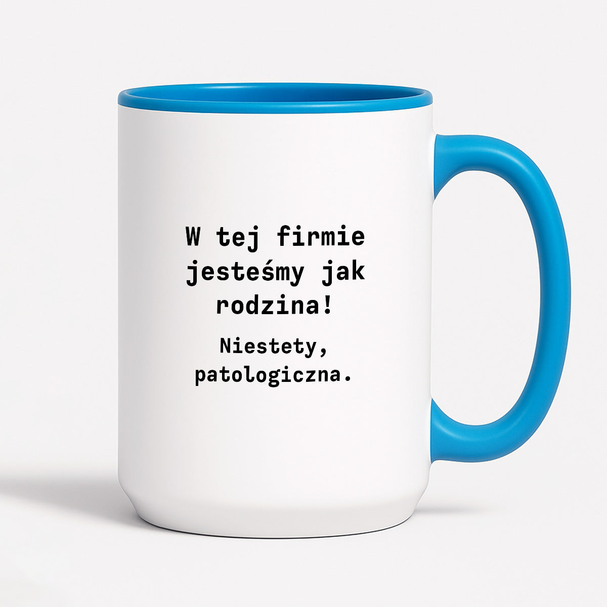 Kubek z nadrukiem "W tej firmie jestesmy jak rodzina! Niestety, patologiczna."
