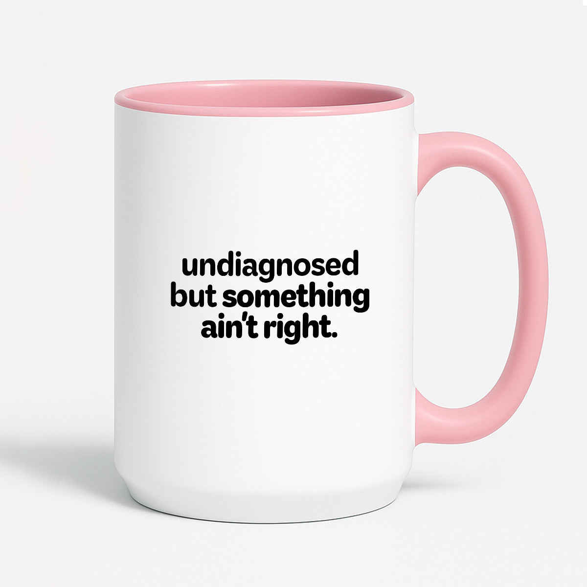 Kubek z nadrukiem - "undiagnosed but something ain't right"