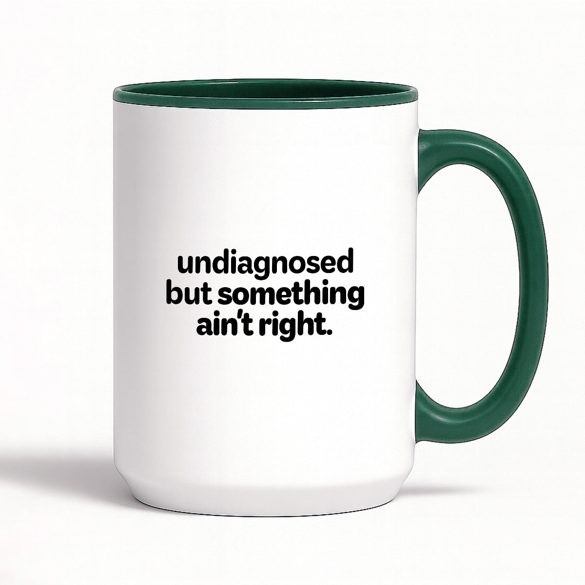 Kubek z nadrukiem - "undiagnosed but something ain't right"