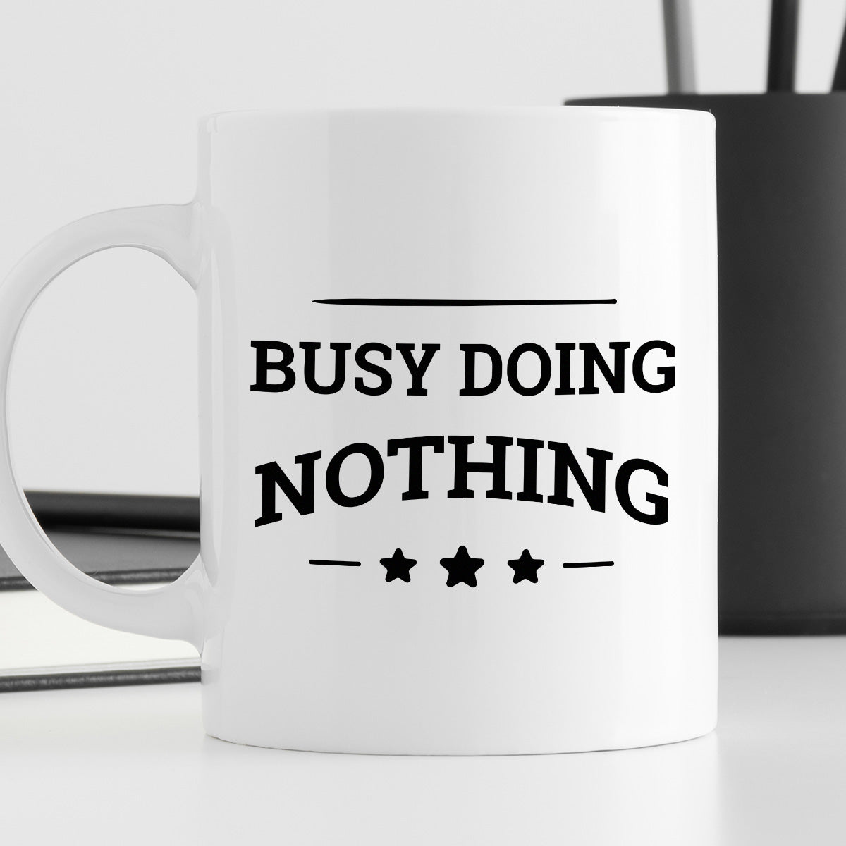 Kubek z nadrukiem "Busy doing nothing"