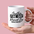 Kubek z nadrukiem "Another fine day ruined by adulthood"