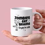 Kubek z nadrukiem "Zombies eat brains, so you’re safe"