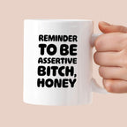 Kubek z nadrukiem "Reminder to be assertive bitch, honey"