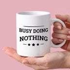 Kubek z nadrukiem "Busy doing nothing"