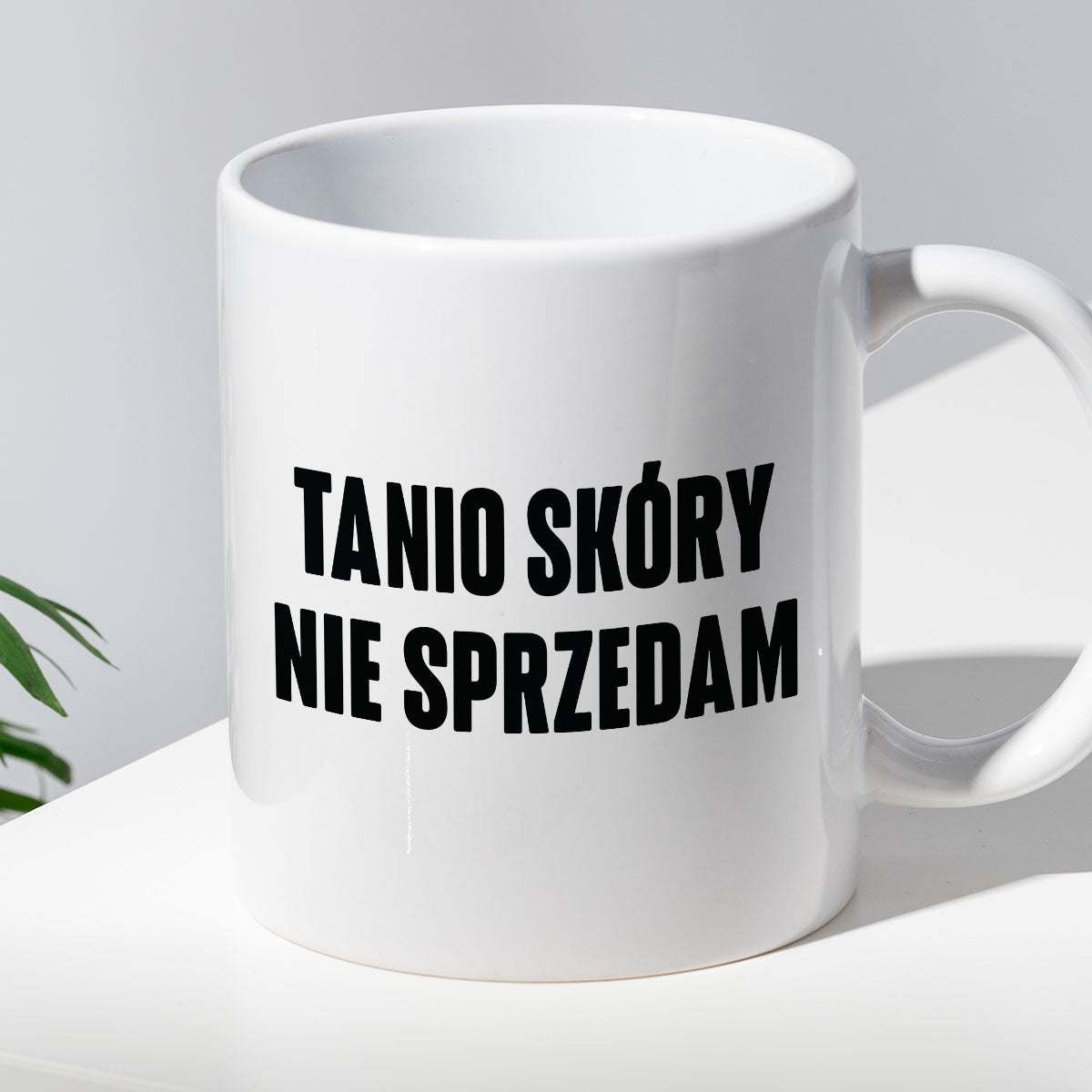 Kubek z nadrukiem "Tanio skóry nie sprzedam" cytat M. Pudzianowski