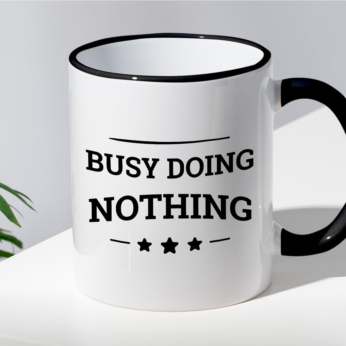 Kubek z nadrukiem "Busy doing nothing"