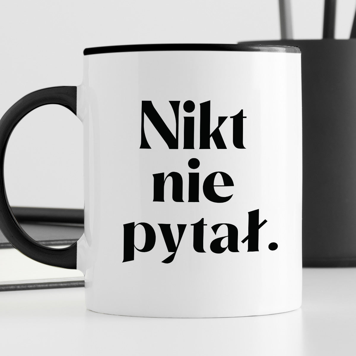 Kubek z nadrukiem "Nikt nie pytał."