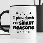 Kubek z nadrukiem "I play dumb for smart reasons"