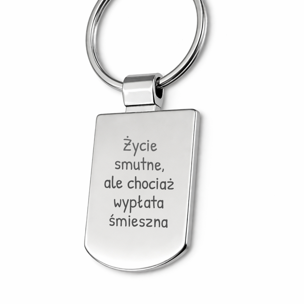 Brelok z grawerem "Życie smutne, ale chociaż wypłata śmieszna"