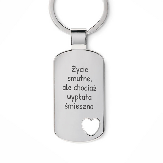 Brelok z grawerem "Życie smutne, ale chociaż wypłata śmieszna"